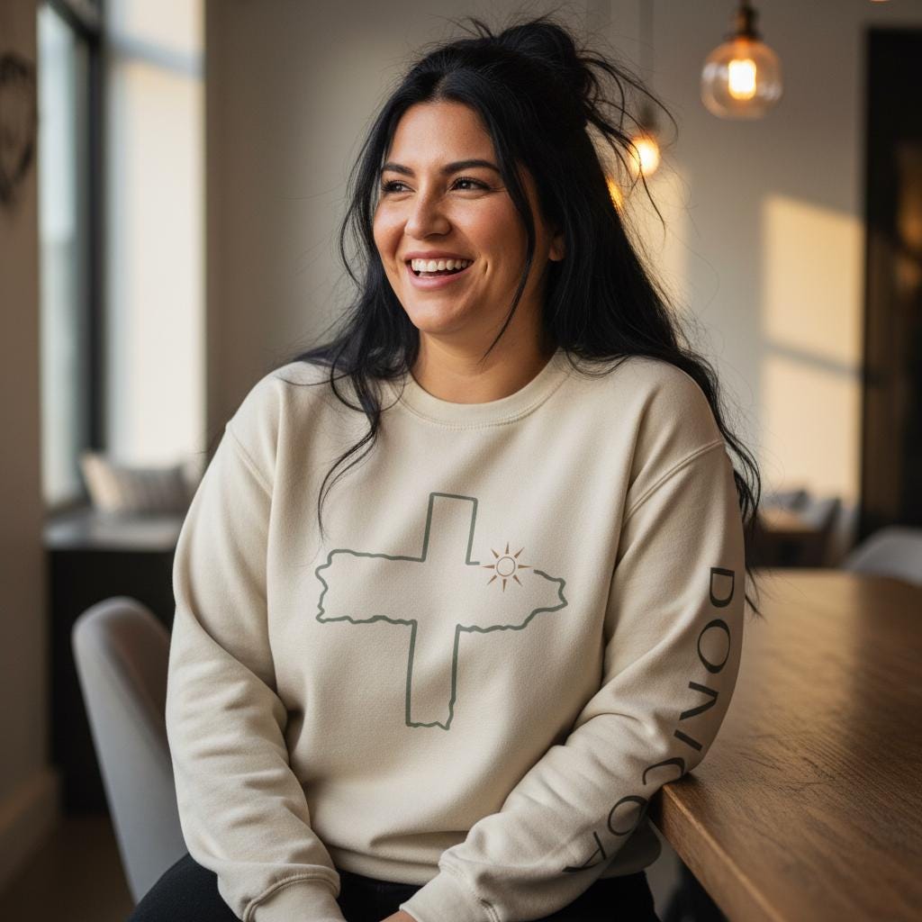 Unisex Distressed Cross with Sun Crewneck Sweatshirt | Bodicia Sleeve Text